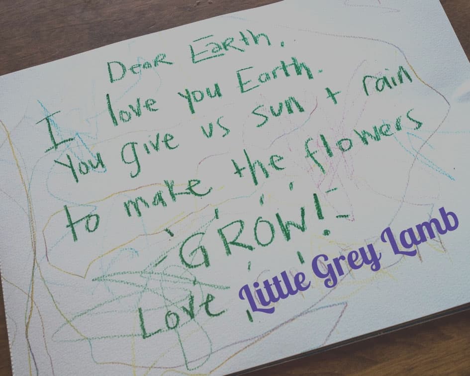 A love letter to Earth, in green crayon on thick paper, written by the author Brianna Sharpe’s child.