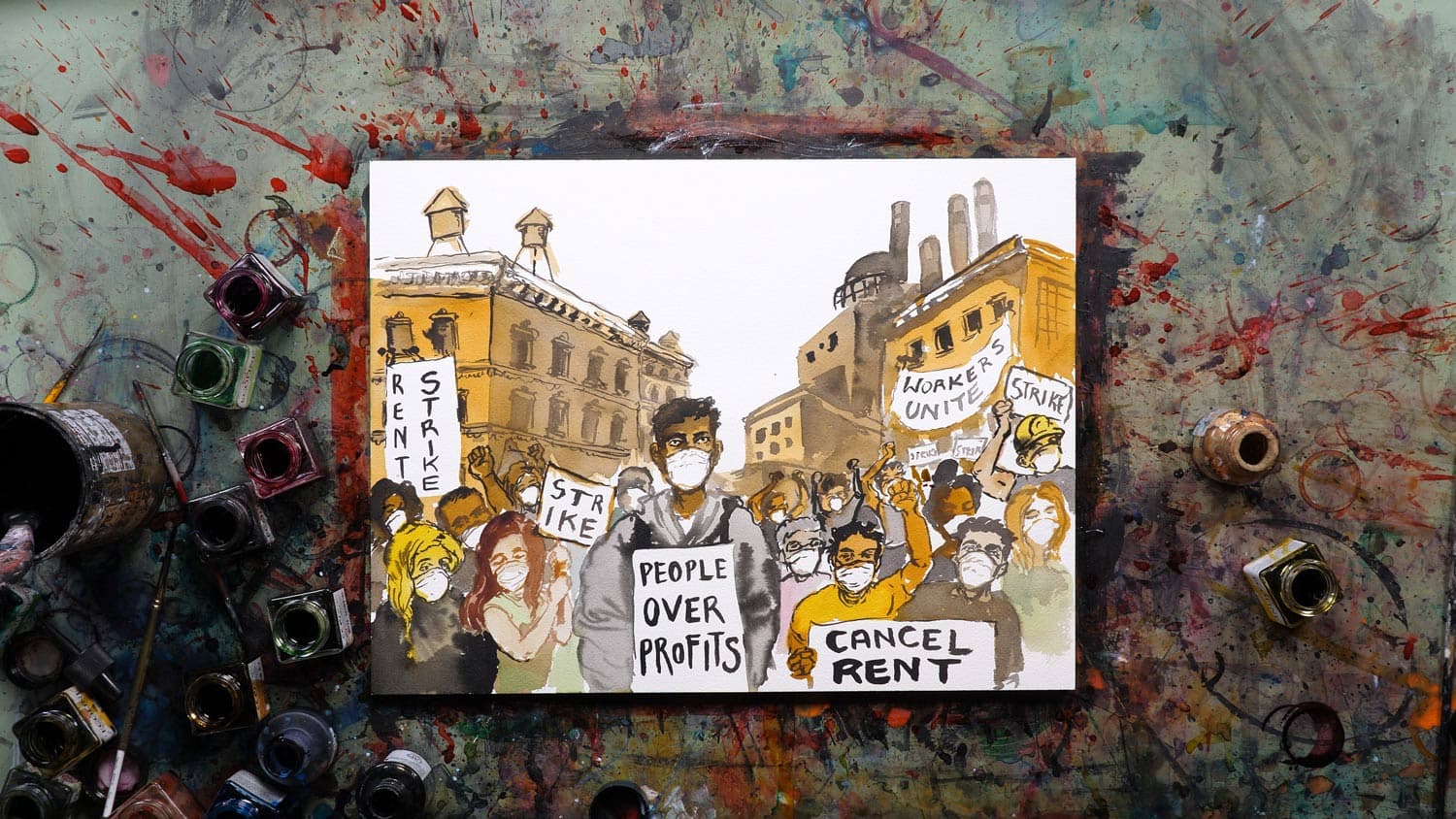 A painting of protesters holding signs surrounded by paint bottles on a paint-splattered floor.